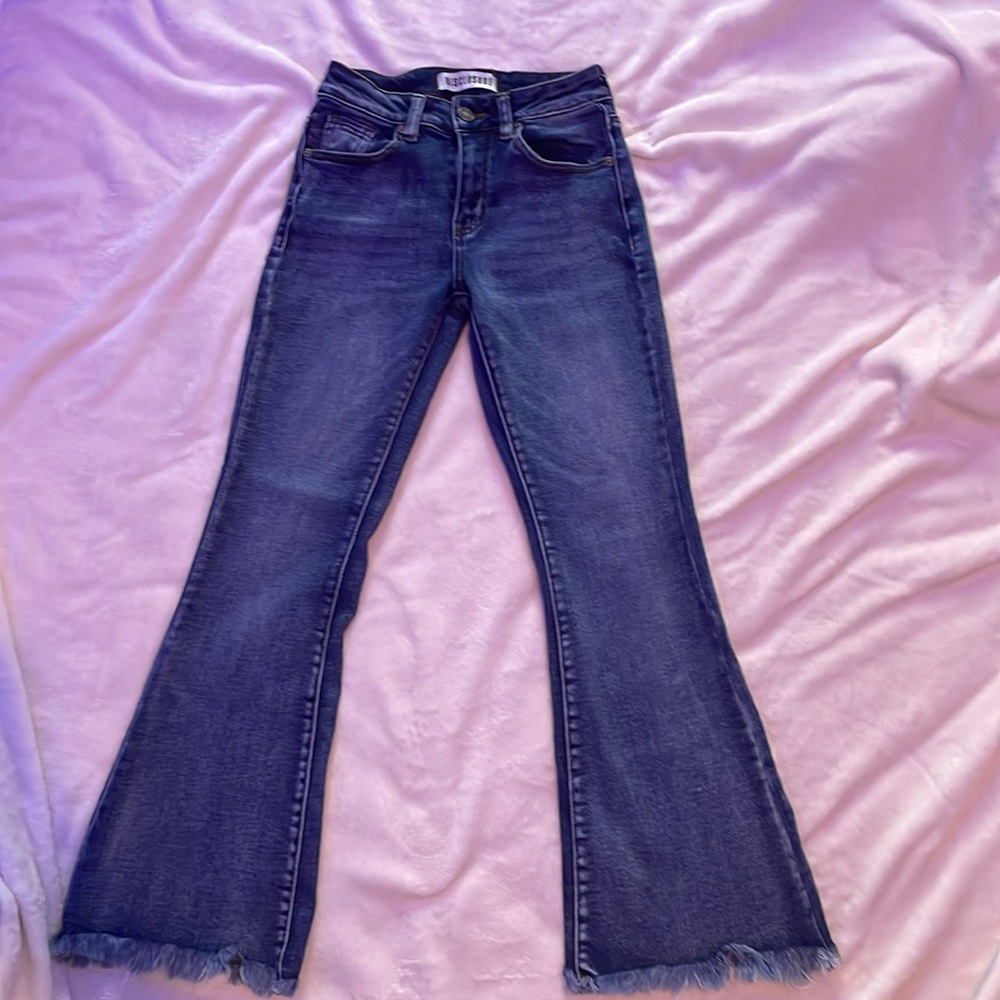 These are bootcut Jeans from Disclosure. They are a darker wash.